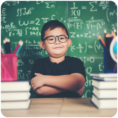 thoughtful-little-boy-with-book-near-school-board